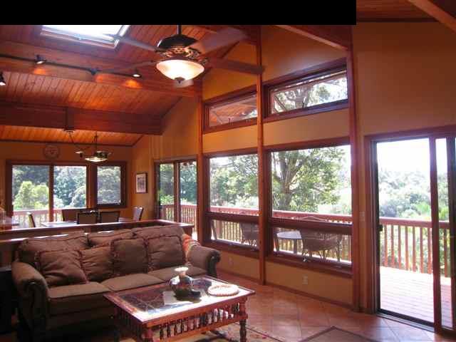 980 East Kuiaha Road Haiku, HI 96708 - Photo 6 of 25 a living room with furniture and a large window