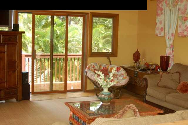 980 East Kuiaha Road Haiku, HI 96708 - Photo 8 of 25 a living room with large windows