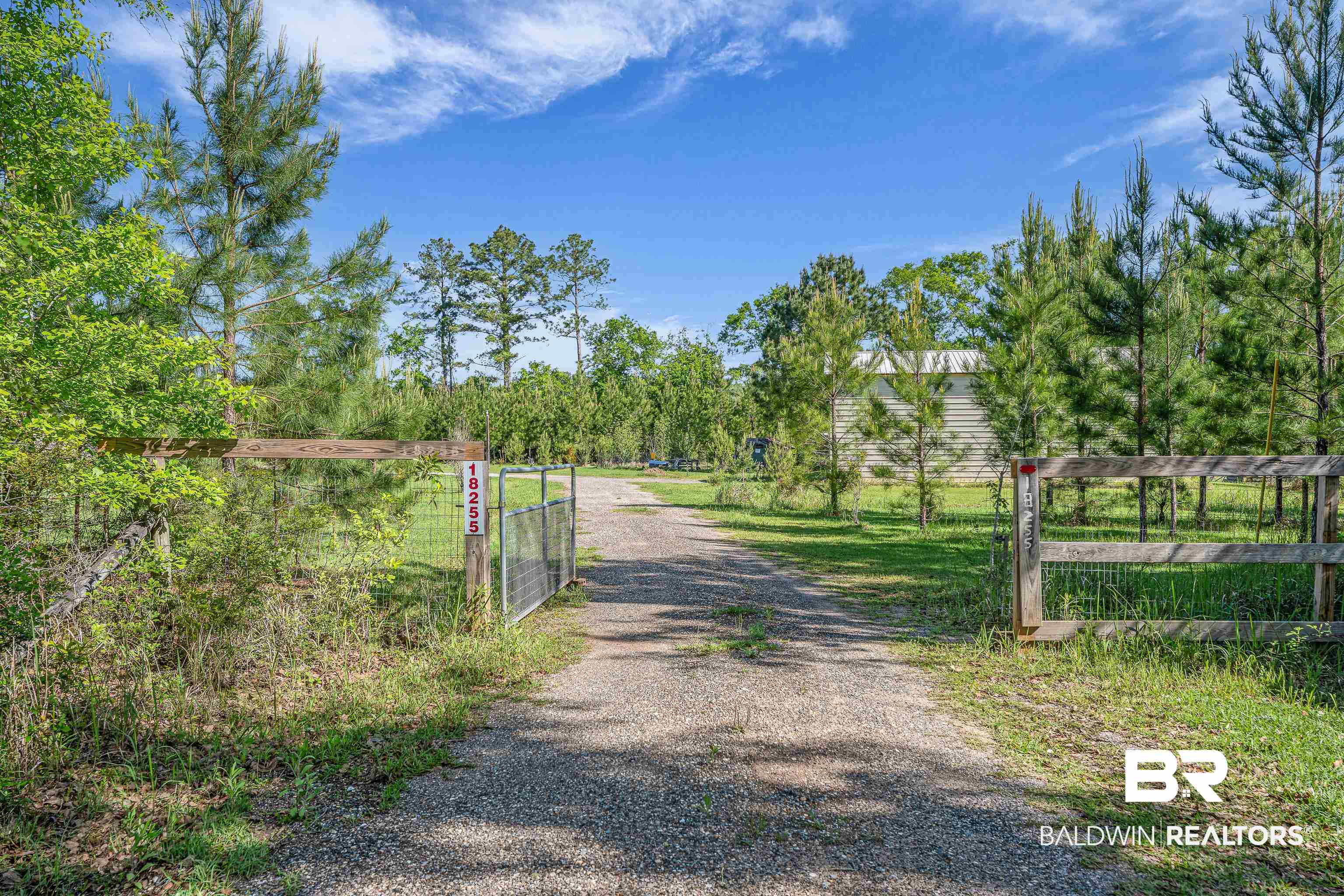 18255 Cactus Court Elberta, AL 36530 - Photo 32 of 53 View of dirt / gravel road with a gate and a gated entry