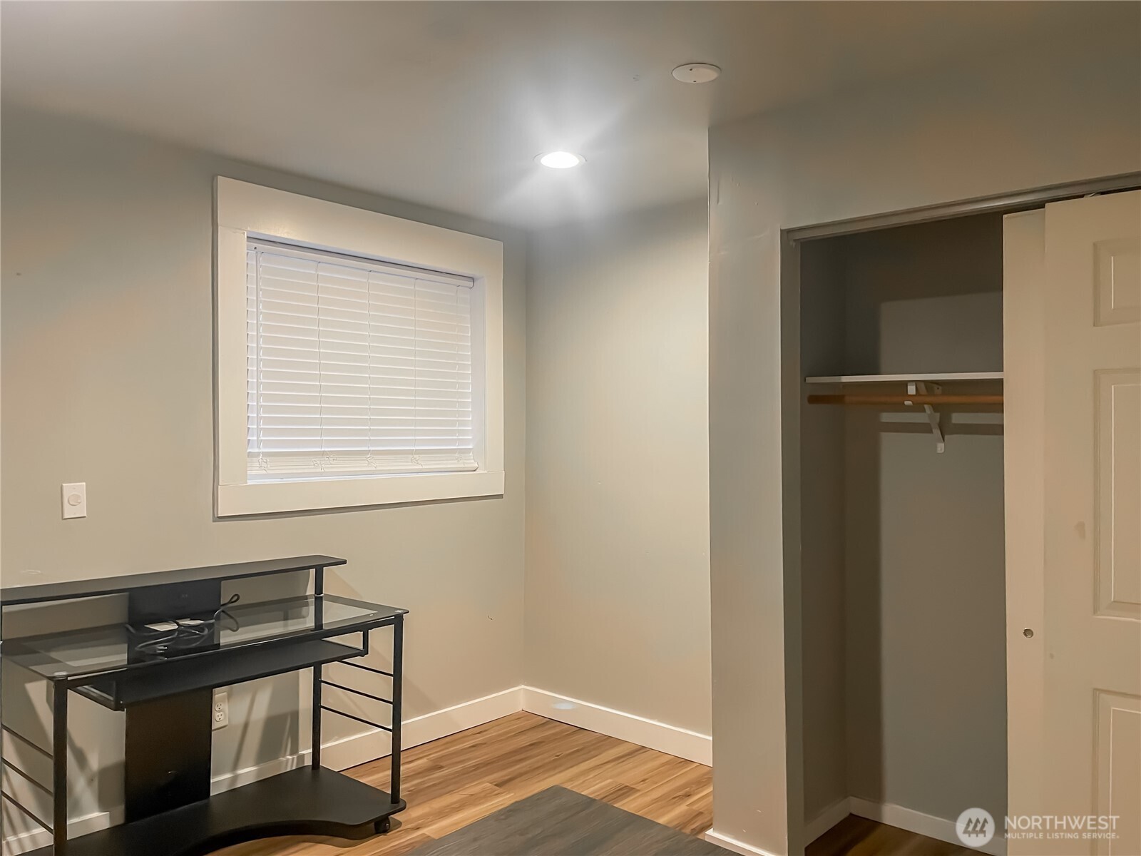 1815 13th Avenue South Seattle, WA 98144 - Photo 14 of 18 a view of a workspace with furniture and wooden floor