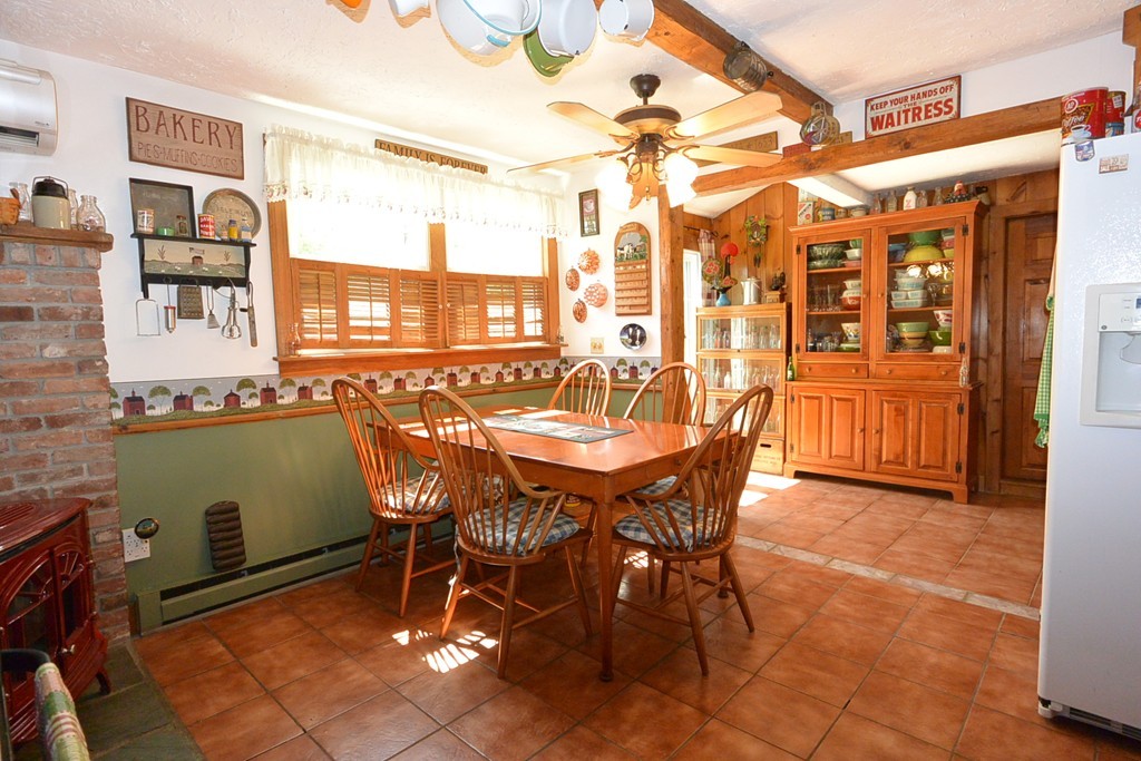 217 Old Common Road Lancaster, MA 01523 - Photo 11 of 22 a dining area with furniture and window