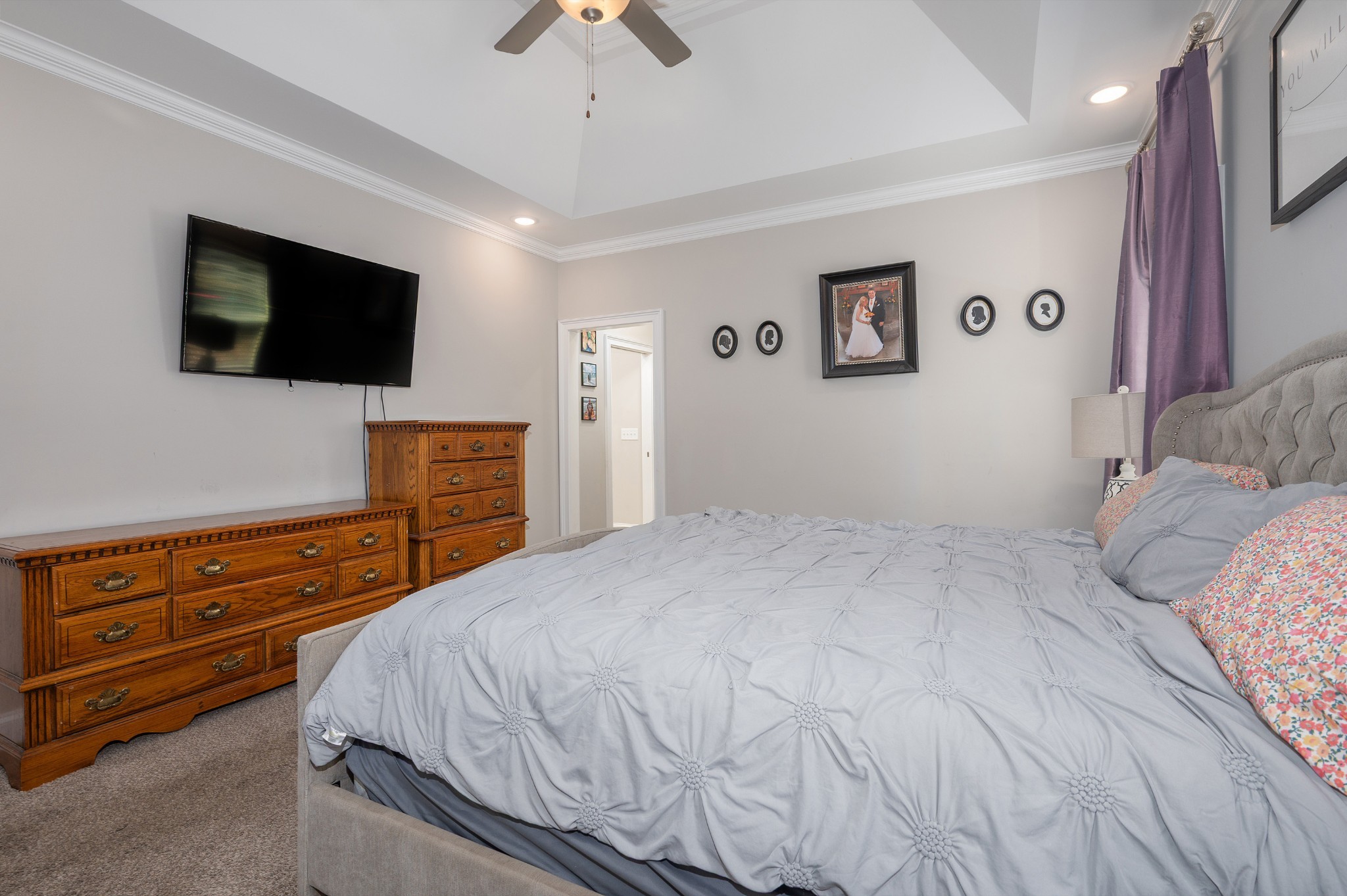 1835 Belotes Ferry Road Lebanon, TN 37087 - Photo 14 of 40 a bedroom with a bed and a flat screen tv