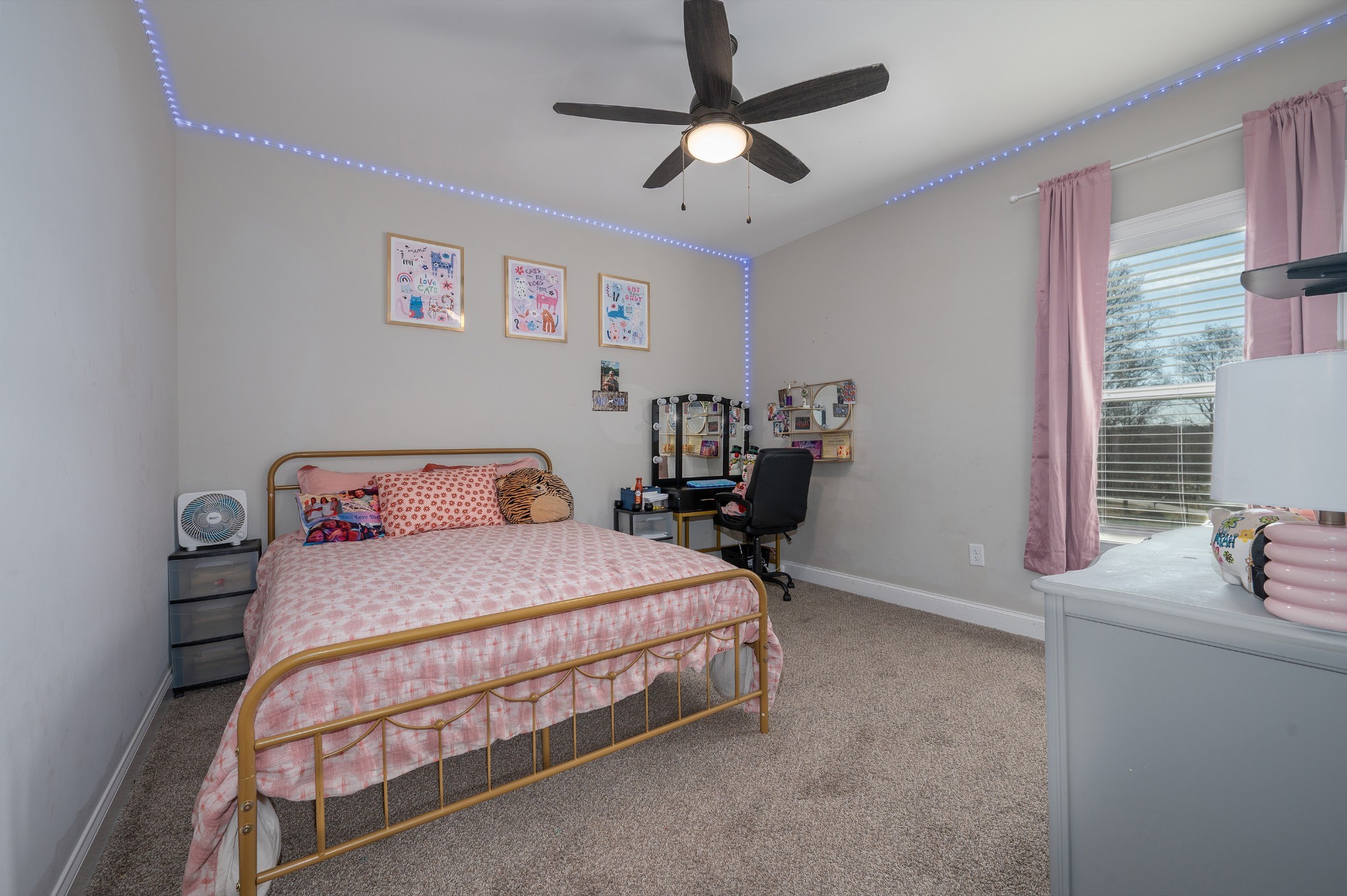 1835 Belotes Ferry Road Lebanon, TN 37087 - Photo 18 of 40 a bedroom with a bed and a chandelier