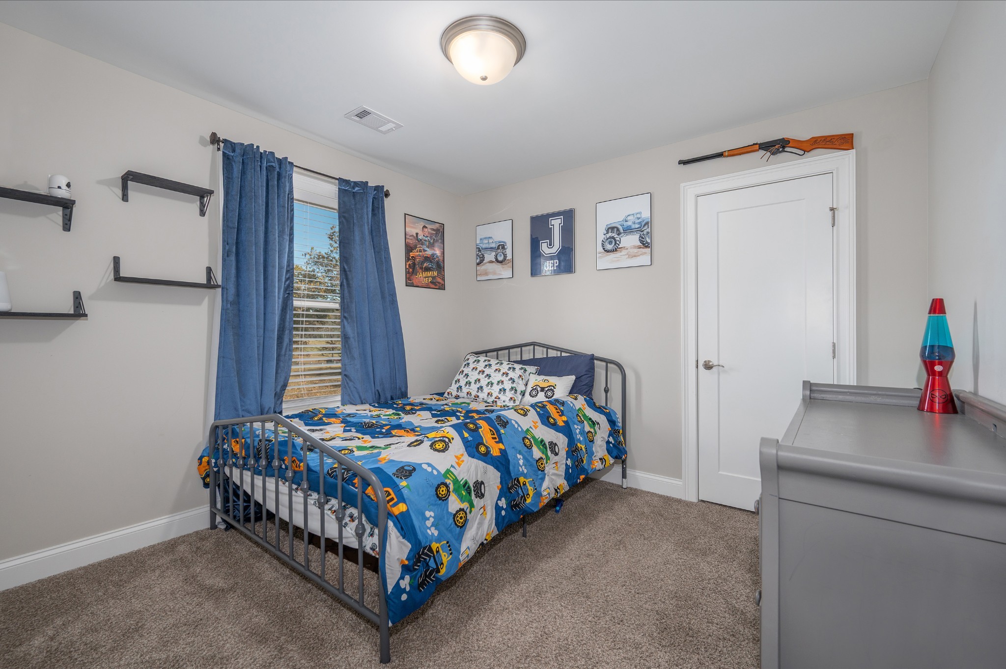 1835 Belotes Ferry Road Lebanon, TN 37087 - Photo 23 of 40 a bedroom with a bed and a window