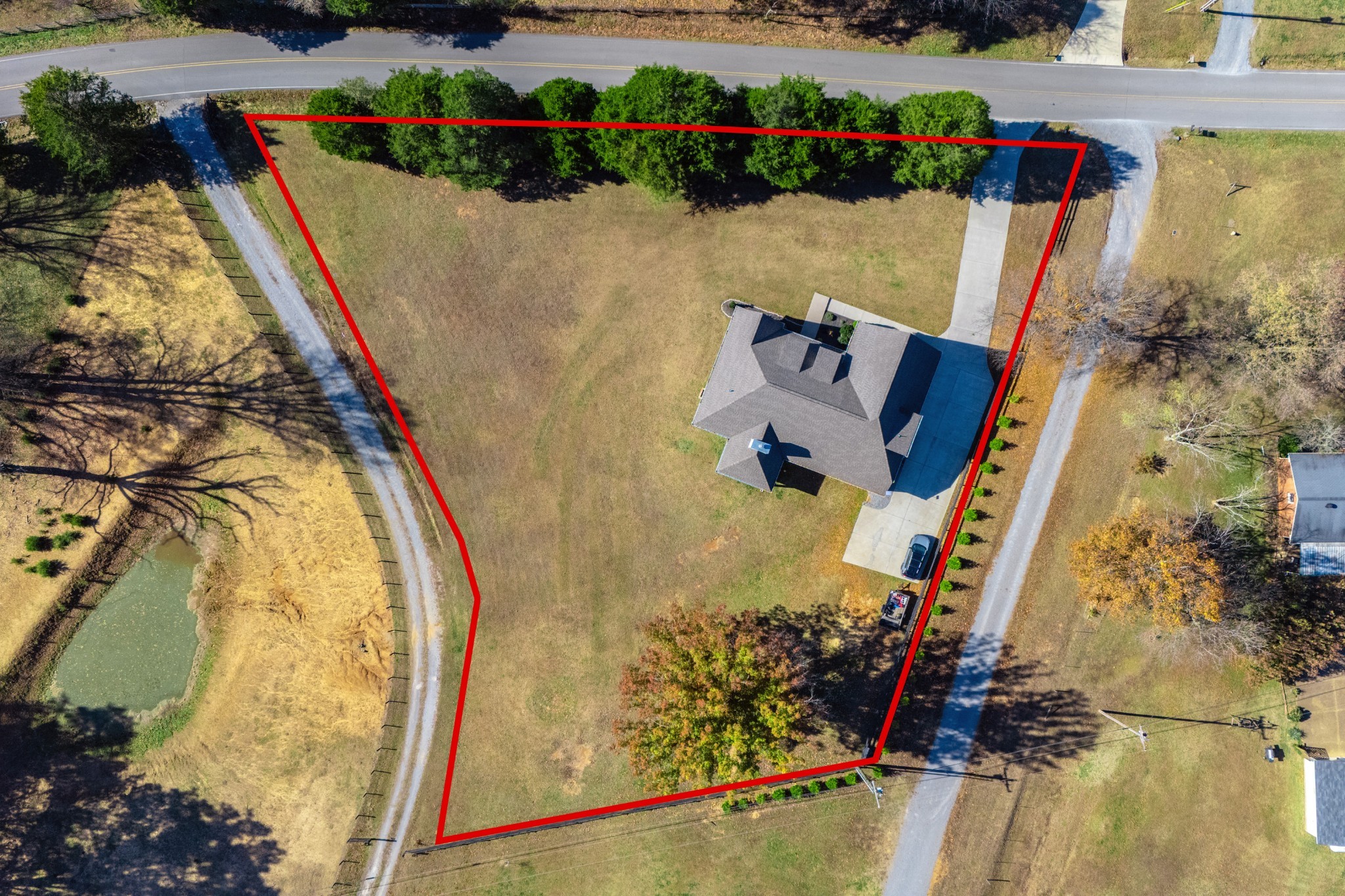 1835 Belotes Ferry Road Lebanon, TN 37087 - Photo 32 of 40 an aerial view of a house with a swimming pool