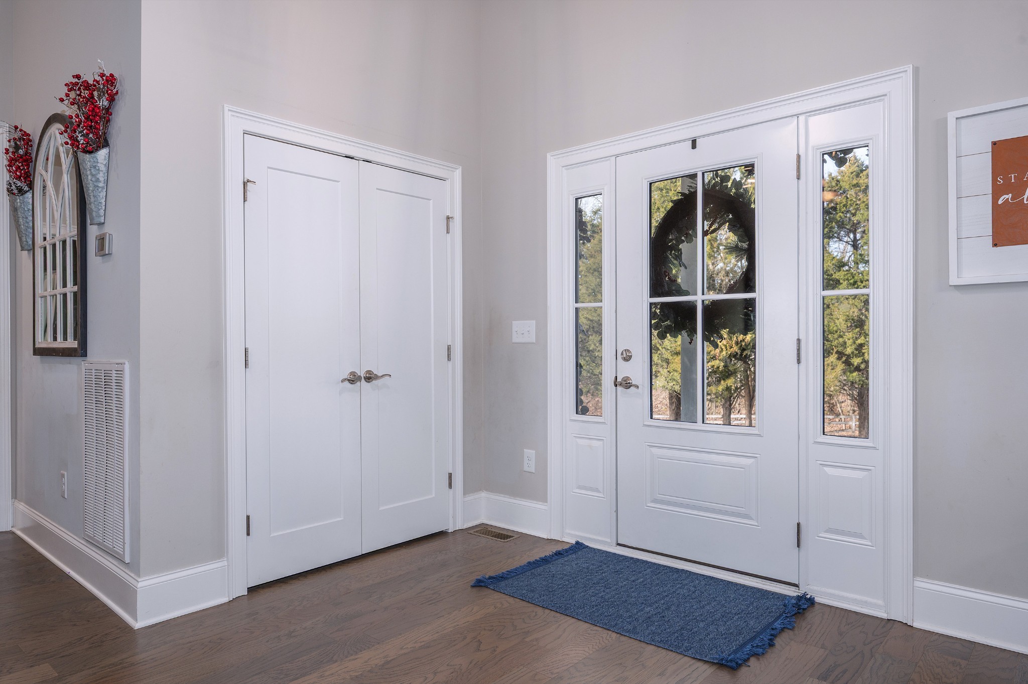 1835 Belotes Ferry Road Lebanon, TN 37087 - Photo 10 of 40 an empty room with windows and entrance