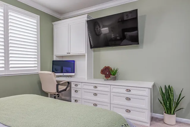 a view of a patio with swimming pool table and chairs