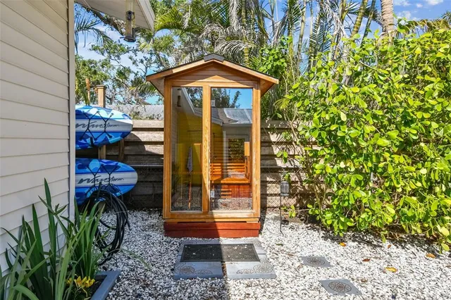a view of a livingroom with furniture and a window