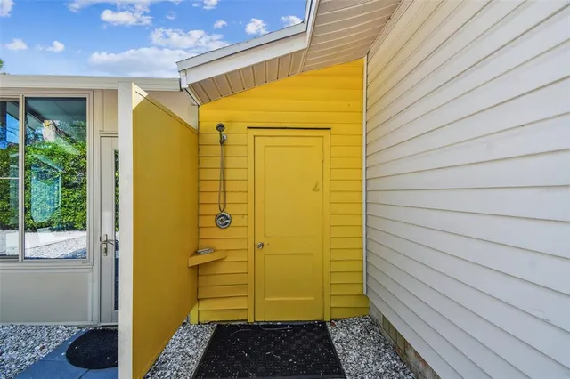 a kitchen that has a stove and a microwave oven