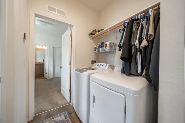 a view of a garage with parked cars