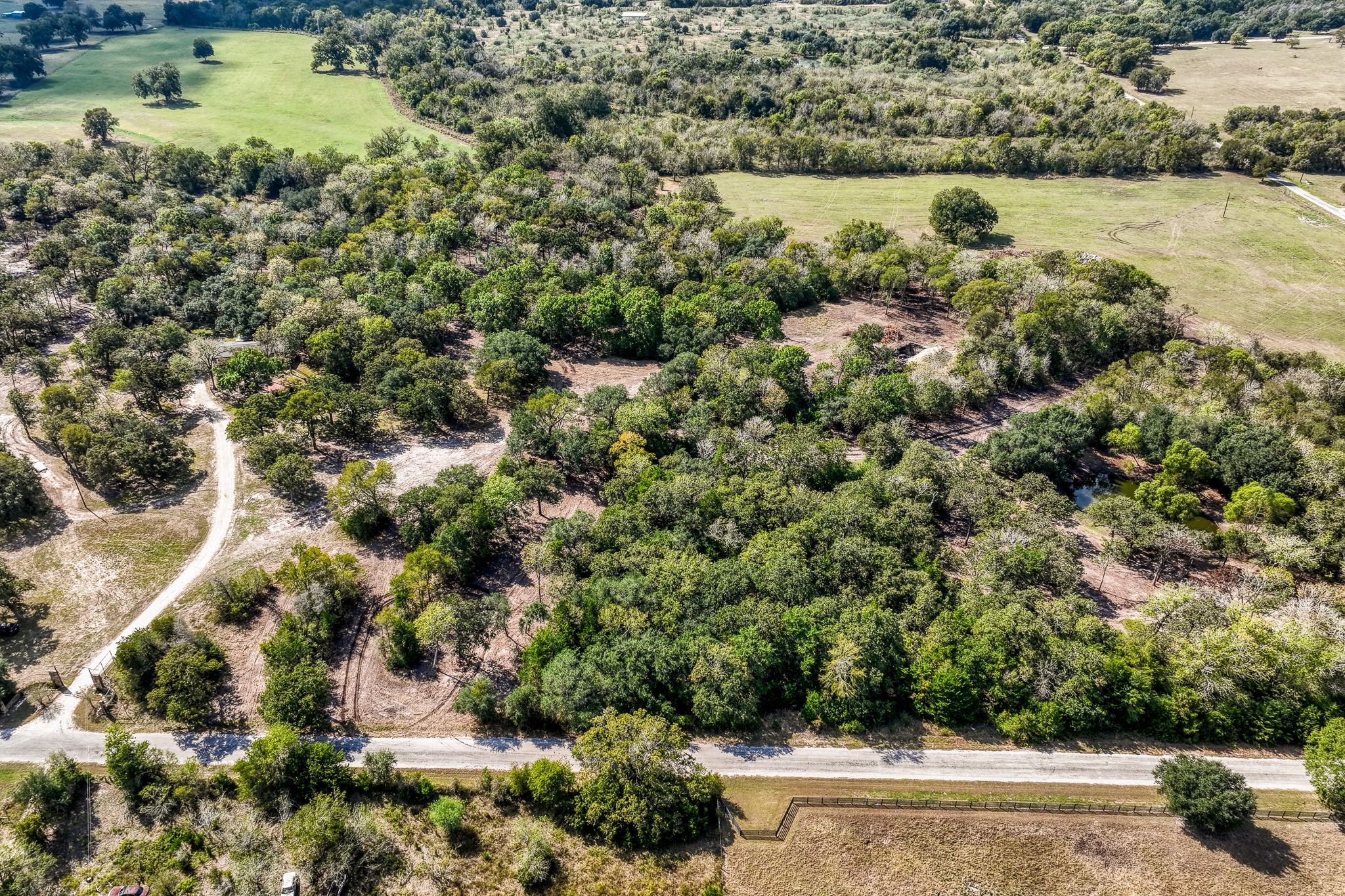 4 Sun Oil Road Brenham, TX 77833 - Photo 34 of 35 an aerial view of a houses with yard and lake view