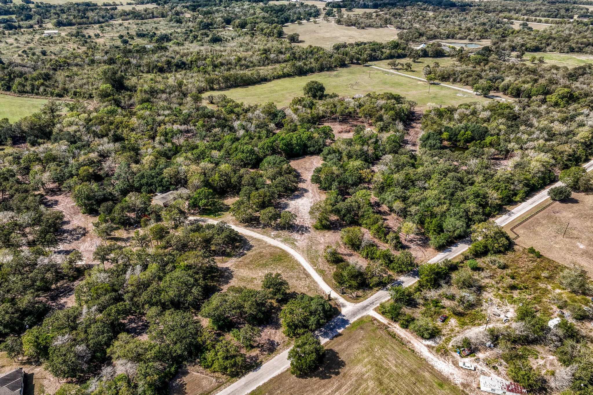 4 Sun Oil Road Brenham, TX 77833 - Photo 35 of 35 an aerial view of residential houses with outdoor space