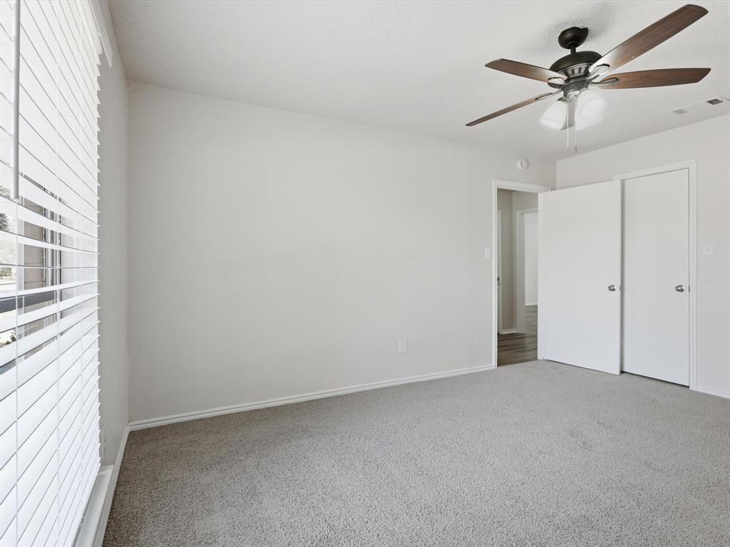 625 Reno Street Lewisville, TX 75077 - Photo 6 of 25 a view of an empty room and a window