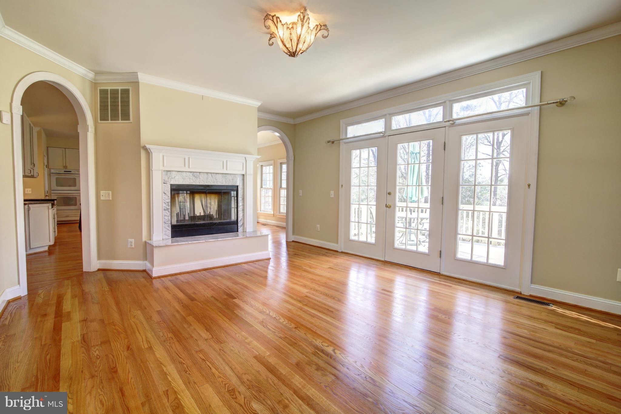 38990 Lime Kiln Road Leesburg, VA 20175 - Photo 15 of 30 a view of an empty room with wooden floor and a window