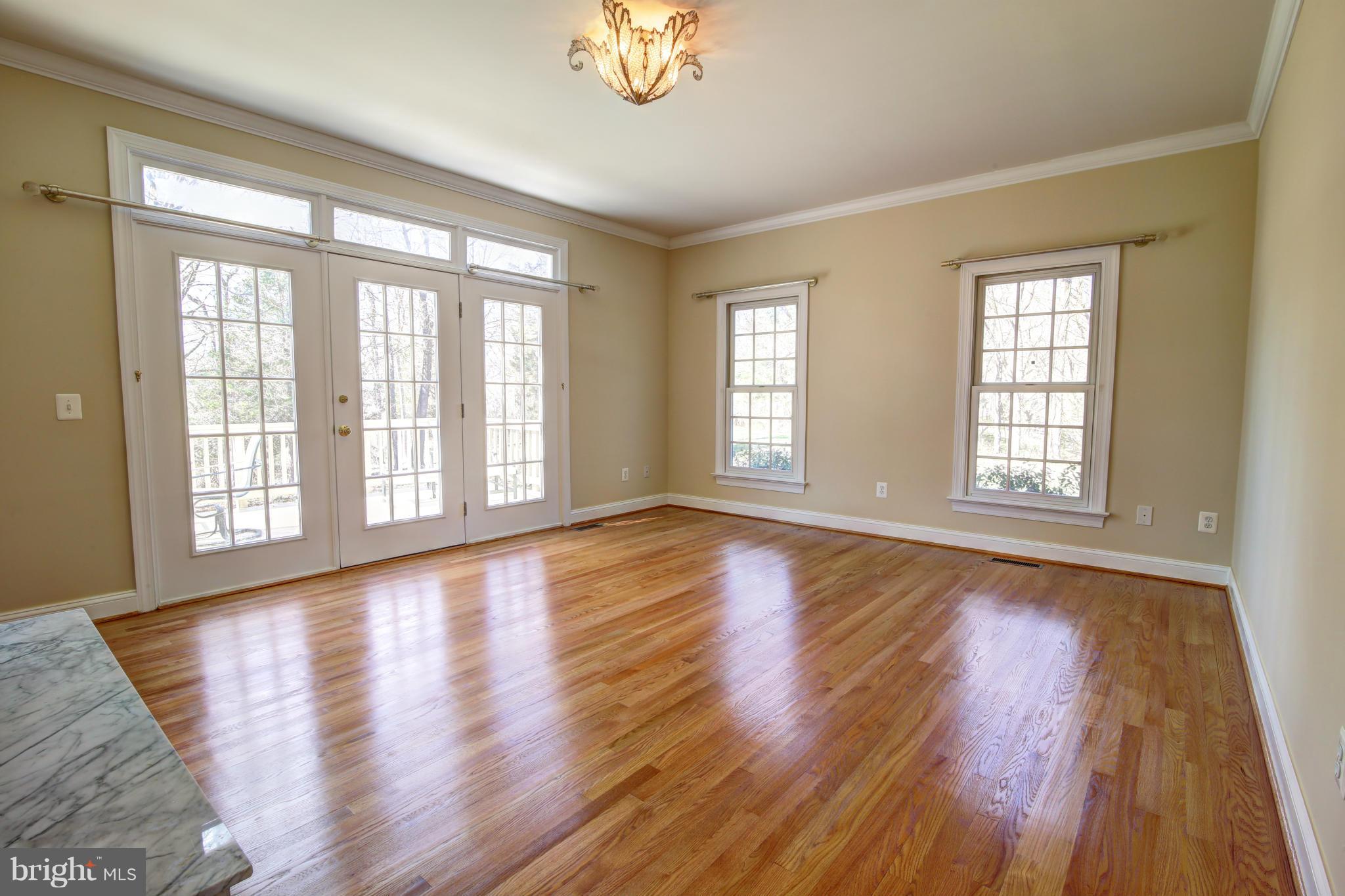 38990 Lime Kiln Road Leesburg, VA 20175 - Photo 16 of 30 a view of an empty room with wooden floor and a window