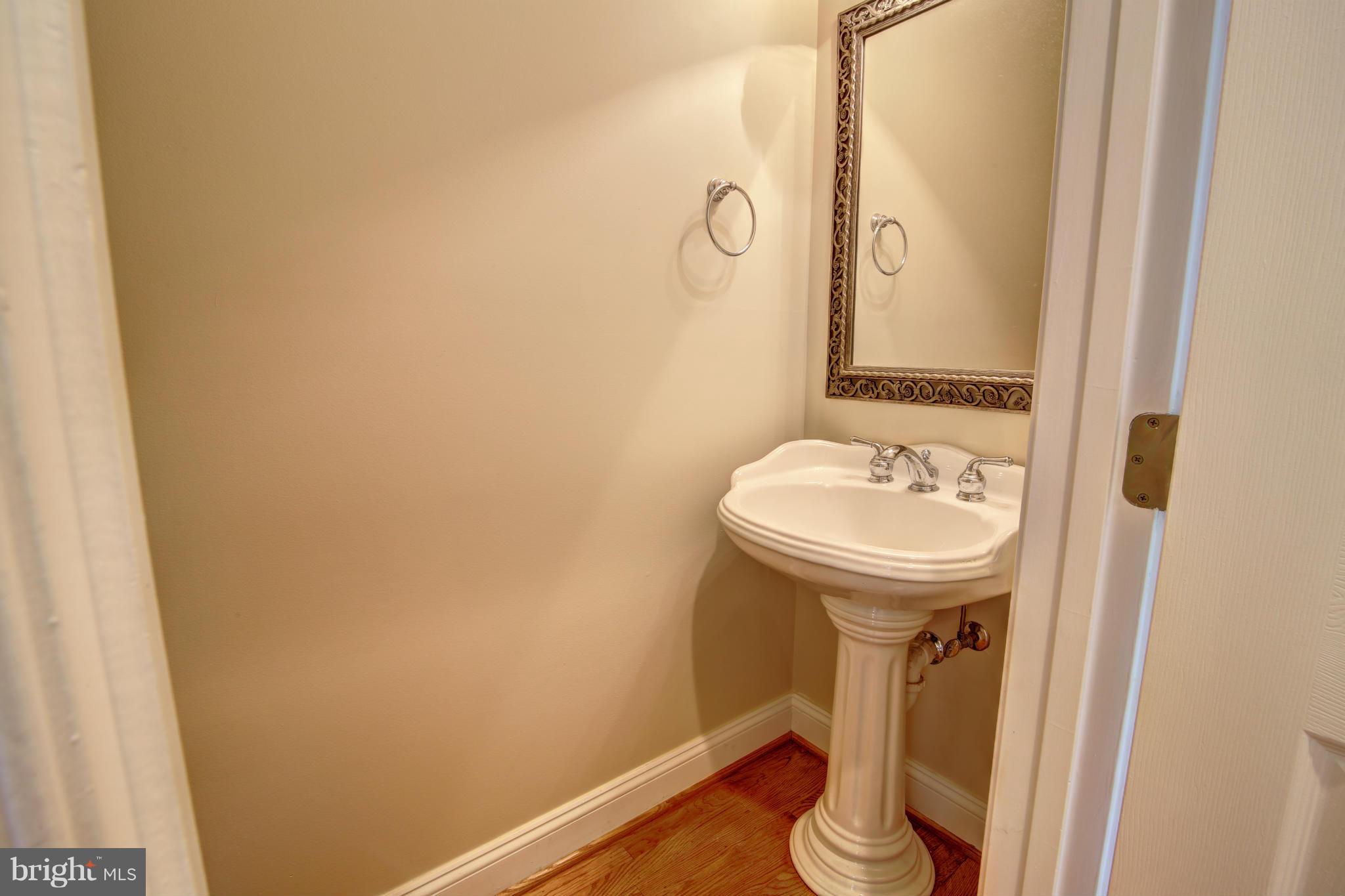 38990 Lime Kiln Road Leesburg, VA 20175 - Photo 17 of 30 a bathroom with a sink and toilet