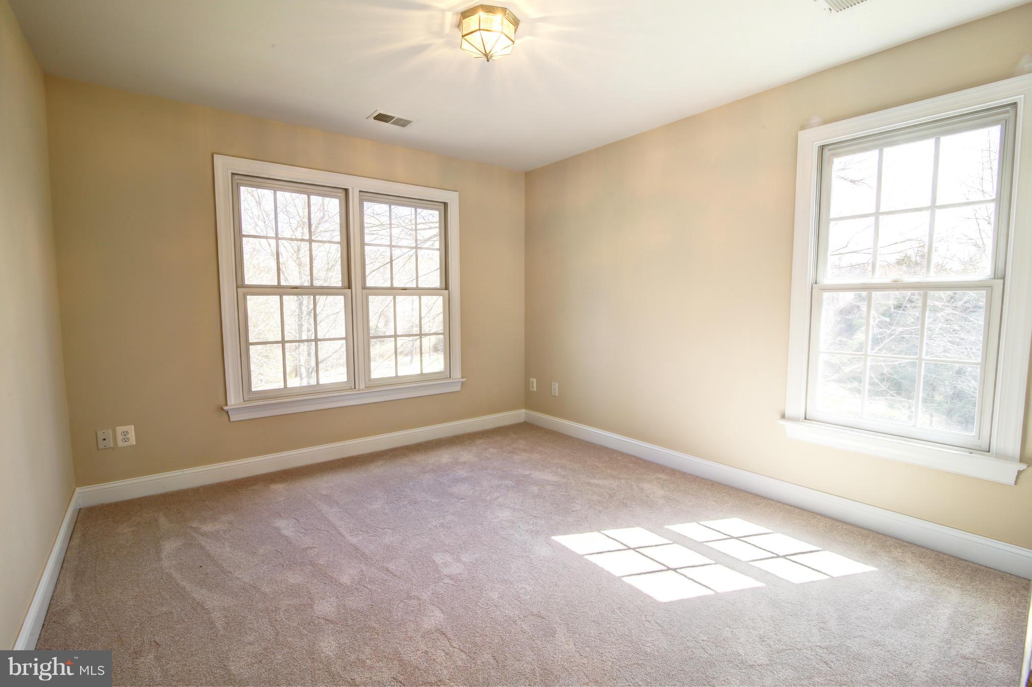 38990 Lime Kiln Road Leesburg, VA 20175 - Photo 24 of 30 a view of an empty room with a window