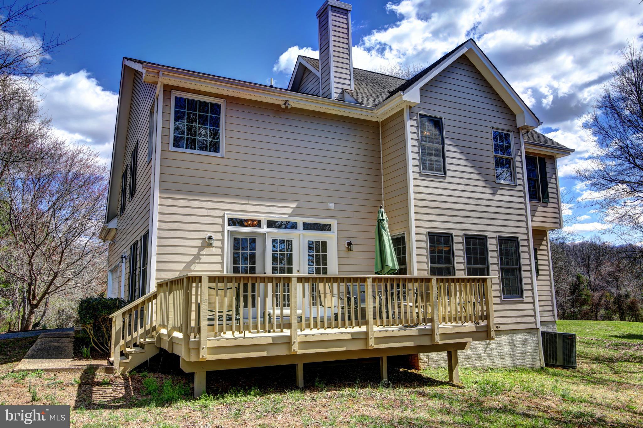 38990 Lime Kiln Road Leesburg, VA 20175 - Photo 29 of 30 a view of a house with a roof deck