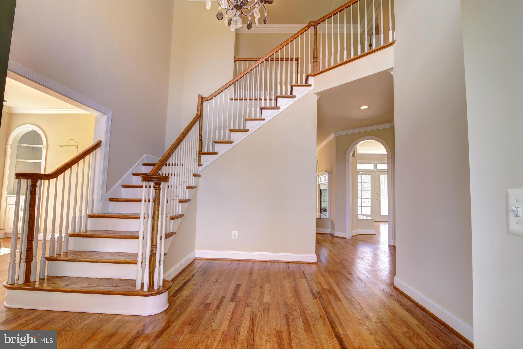 38990 Lime Kiln Road Leesburg, VA 20175 - Photo 5 of 30 a view of entryway and hall with wooden floor