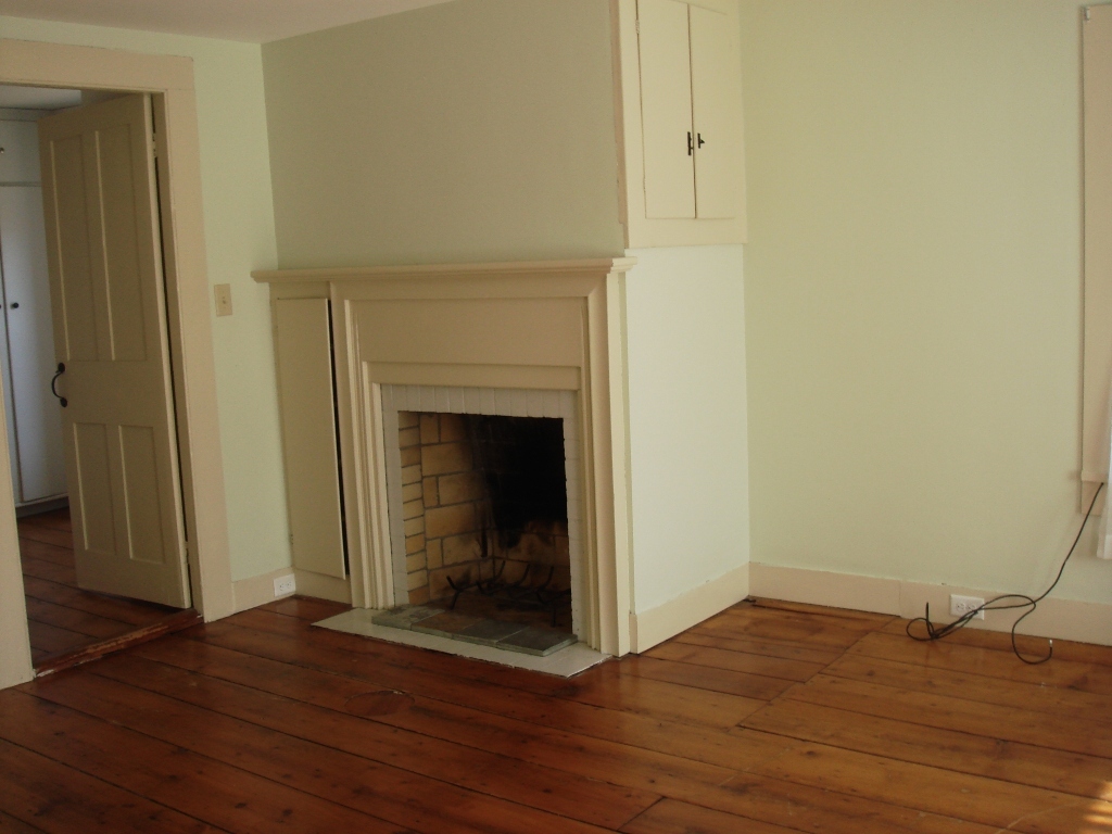 523 Hancock Road Williamstown, MA 01267 - Photo 9 of 16 a view of a livingroom with wooden floor and a fireplace