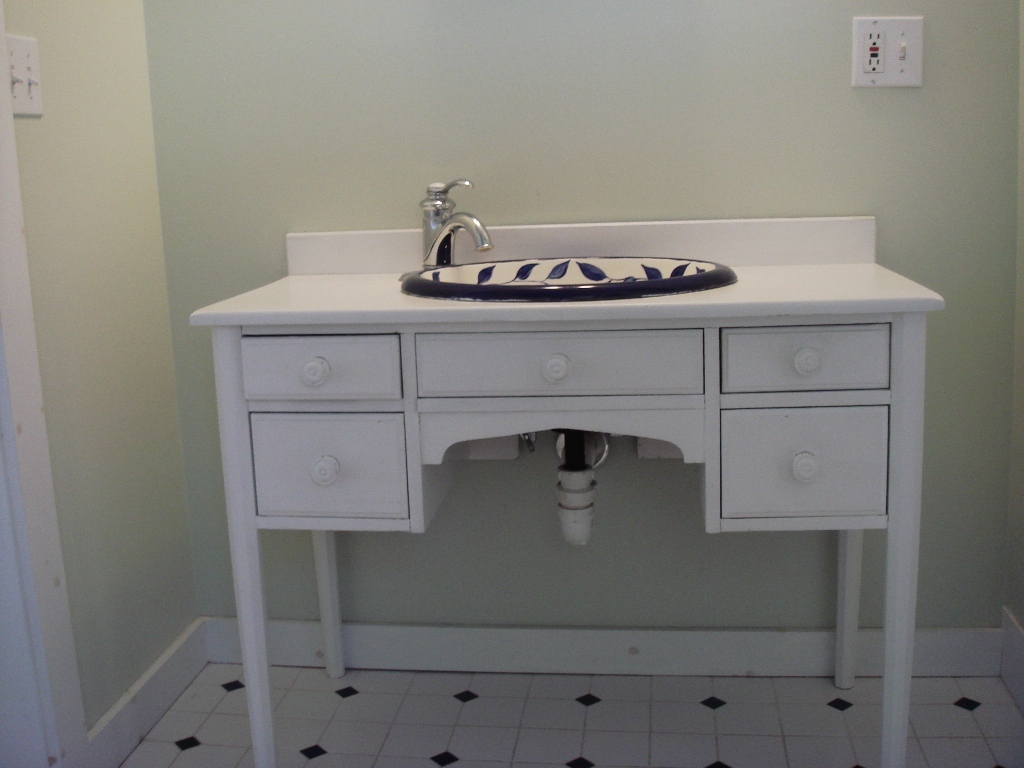 523 Hancock Road Williamstown, MA 01267 - Photo 10 of 16 a bathroom with a sink and a mirror
