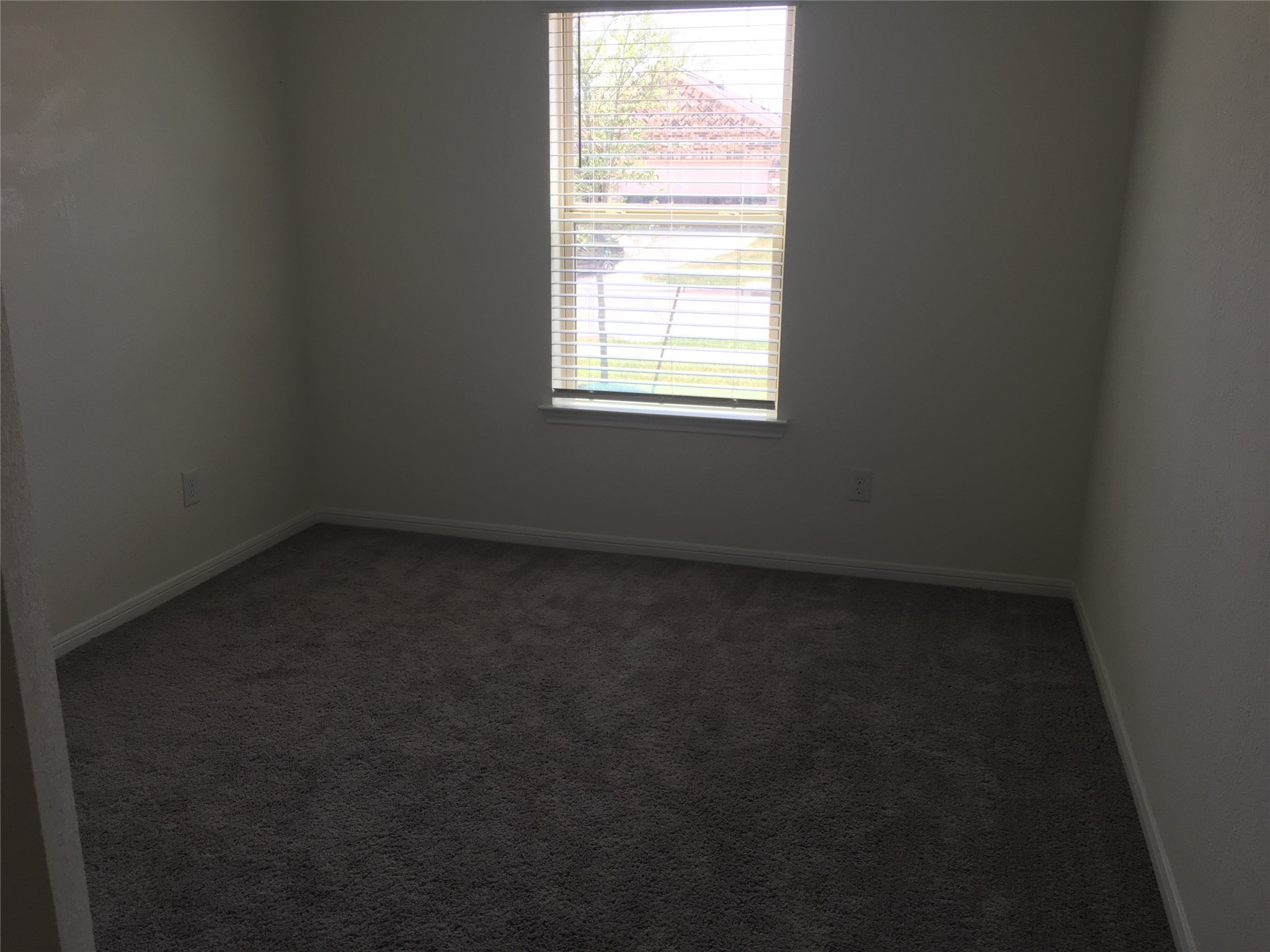 10429 Sherwin Pass Drive Rosharon, TX 77583 - Photo 7 of 11 an empty room with a window