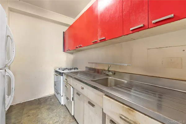 a kitchen with a sink and a cabinets