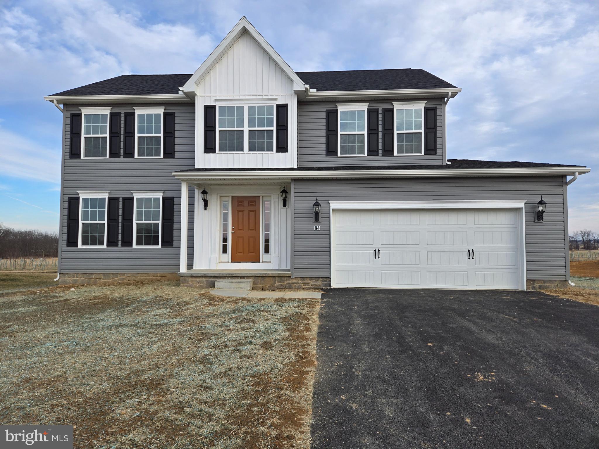 84 Red Stone Lane, Unit 41 Hanover, PA 17331 - Photo 1 of 23 a front view of a house with a yard