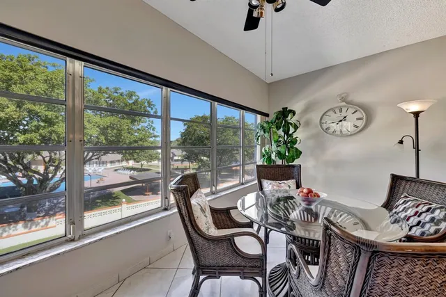 a view of a livingroom with furniture window and outside view