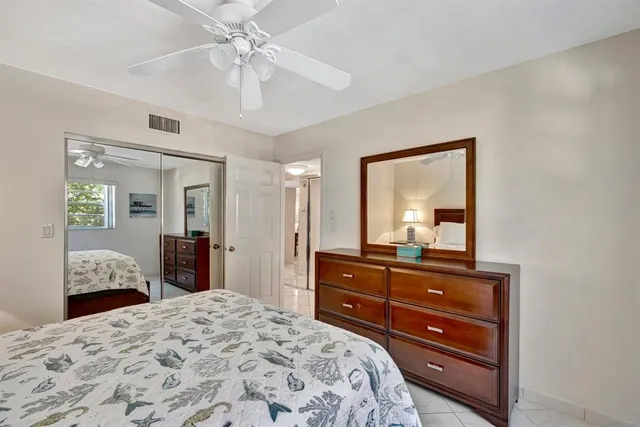 a very nice looking living room with furniture and a large window