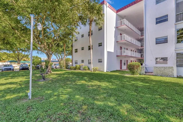 a view of a garden with swimming pool