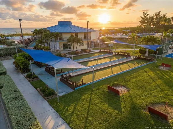 an aerial view of a pool patio swimming pool and outdoor seating