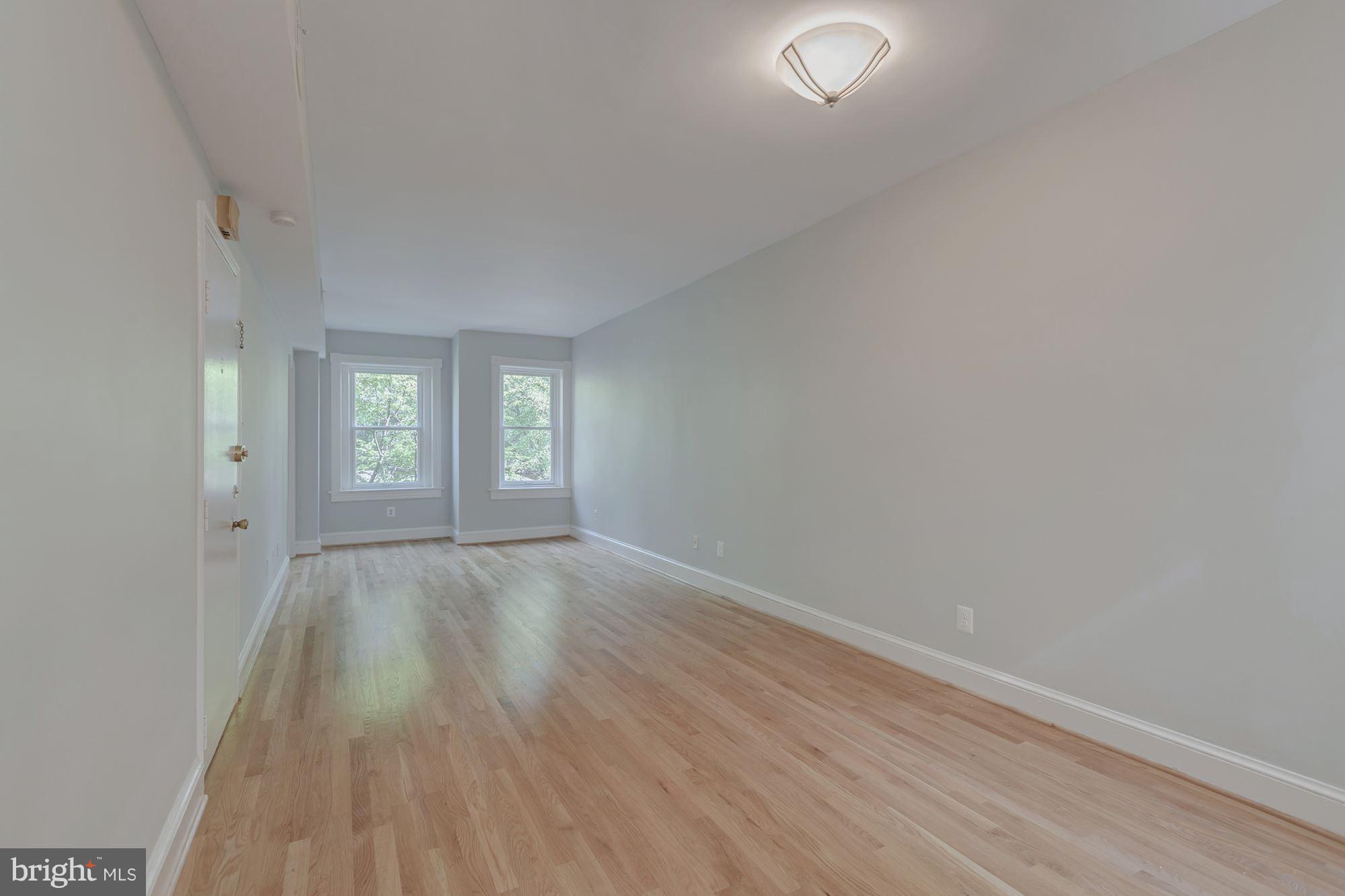 3044 R Street Northwest, Unit 2 Washington, DC 20007 - Photo 3 of 26 Living Room With New White Oak Floors
