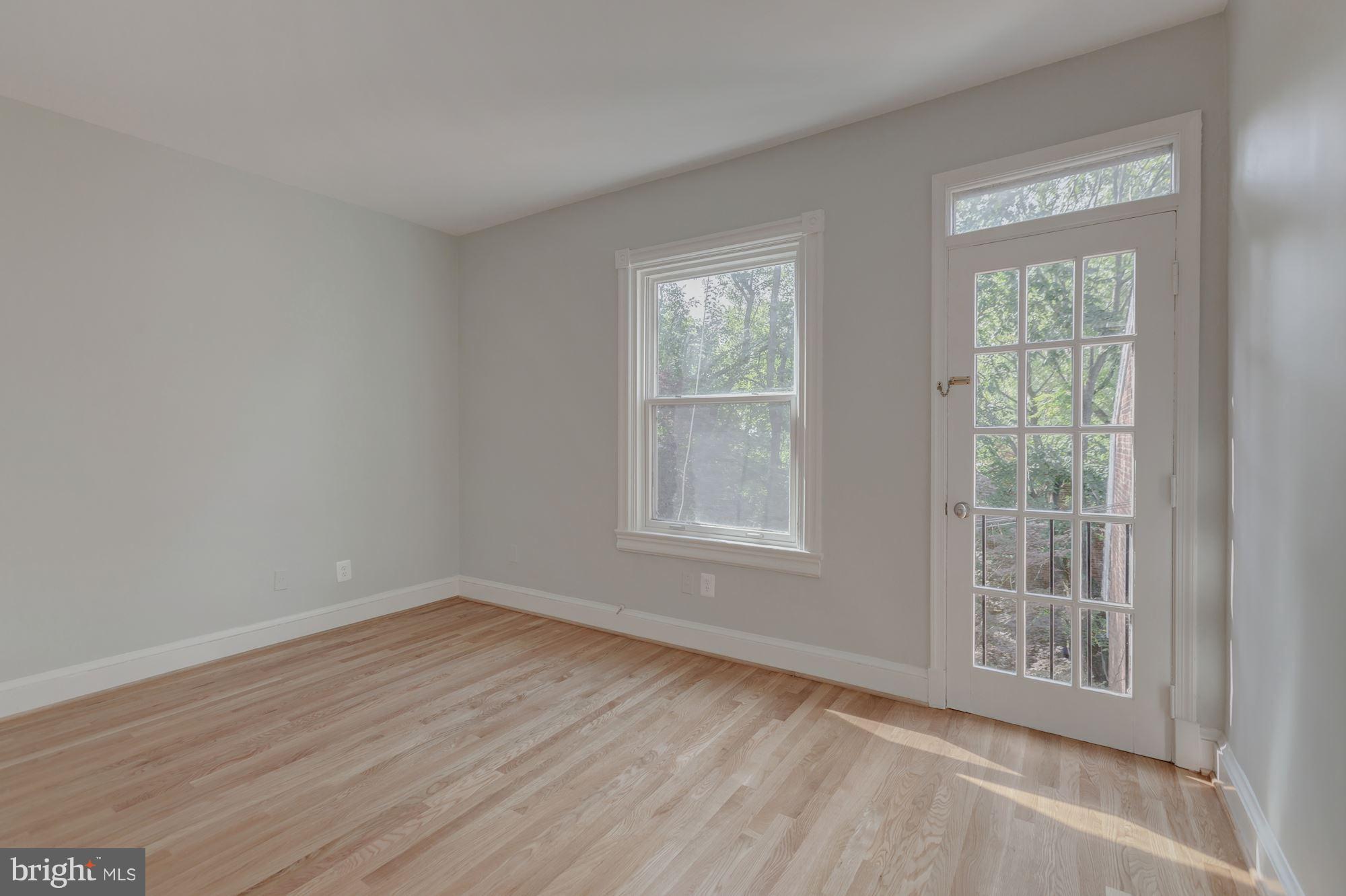 3044 R Street Northwest, Unit 2 Washington, DC 20007 - Photo 9 of 26 Master Bedroom Large Windows