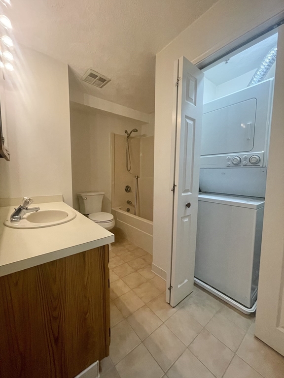 39 Parlin Street, Unit 404 Everett, MA 02149 - Photo 19 of 25 a bathroom with a sink a mirror and a shower