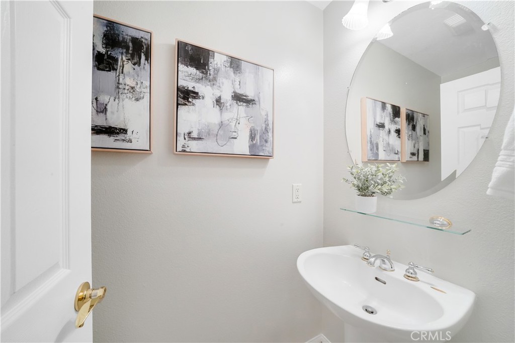 6 Chadron Circle Ladera Ranch, CA 92694 - Photo 16 of 45 a bathroom with a sink and a mirror