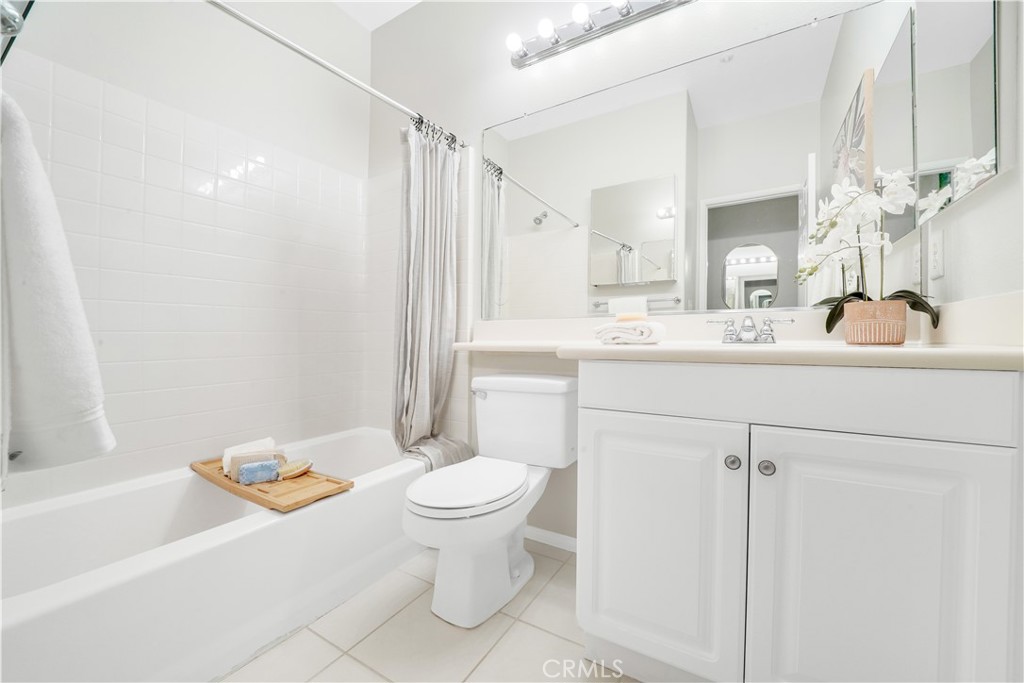 6 Chadron Circle Ladera Ranch, CA 92694 - Photo 19 of 45 a bathroom with a sink toilet a mirror and shower