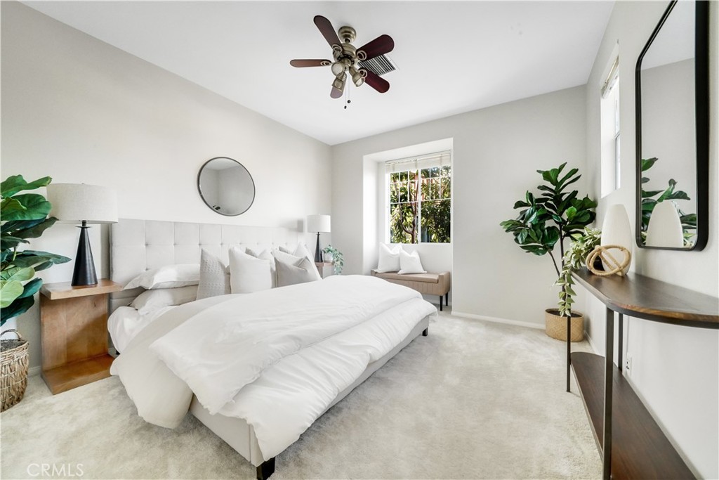 6 Chadron Circle Ladera Ranch, CA 92694 - Photo 22 of 45 a bedroom with bed and a potted plant