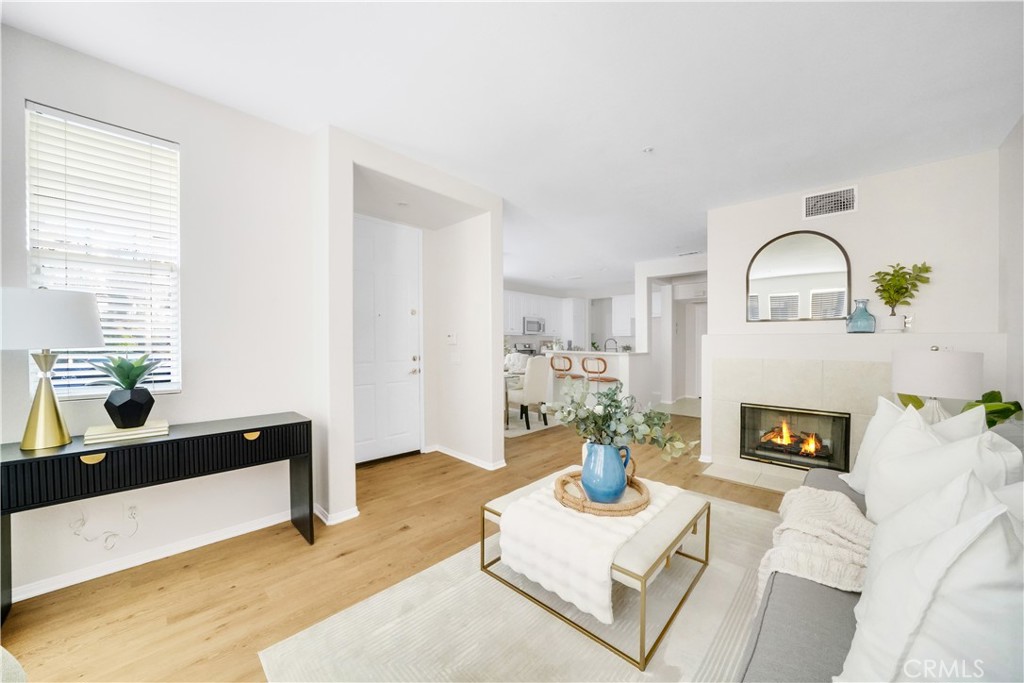 6 Chadron Circle Ladera Ranch, CA 92694 - Photo 6 of 45 a living room with furniture fireplace and a window