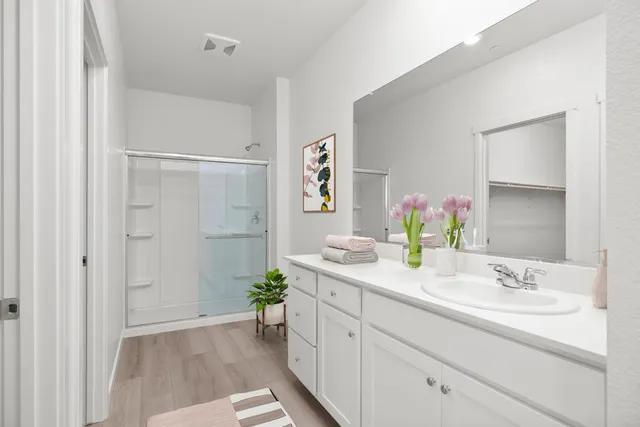 a bathroom with a sink and a mirror