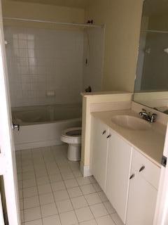 5900 West Sample Road, Unit 204 Coral Springs, FL 33067 - Photo 8 of 10 MASTER BATH VANITY
