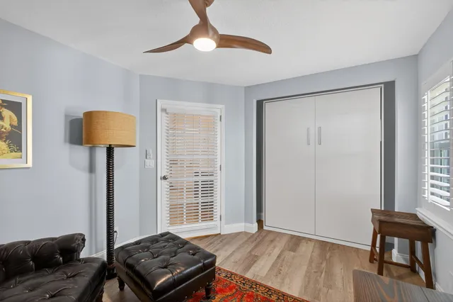 an aerial view of a house with a swimming pool yard and outdoor seating