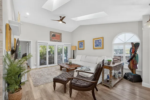 a living room with furniture and a couch