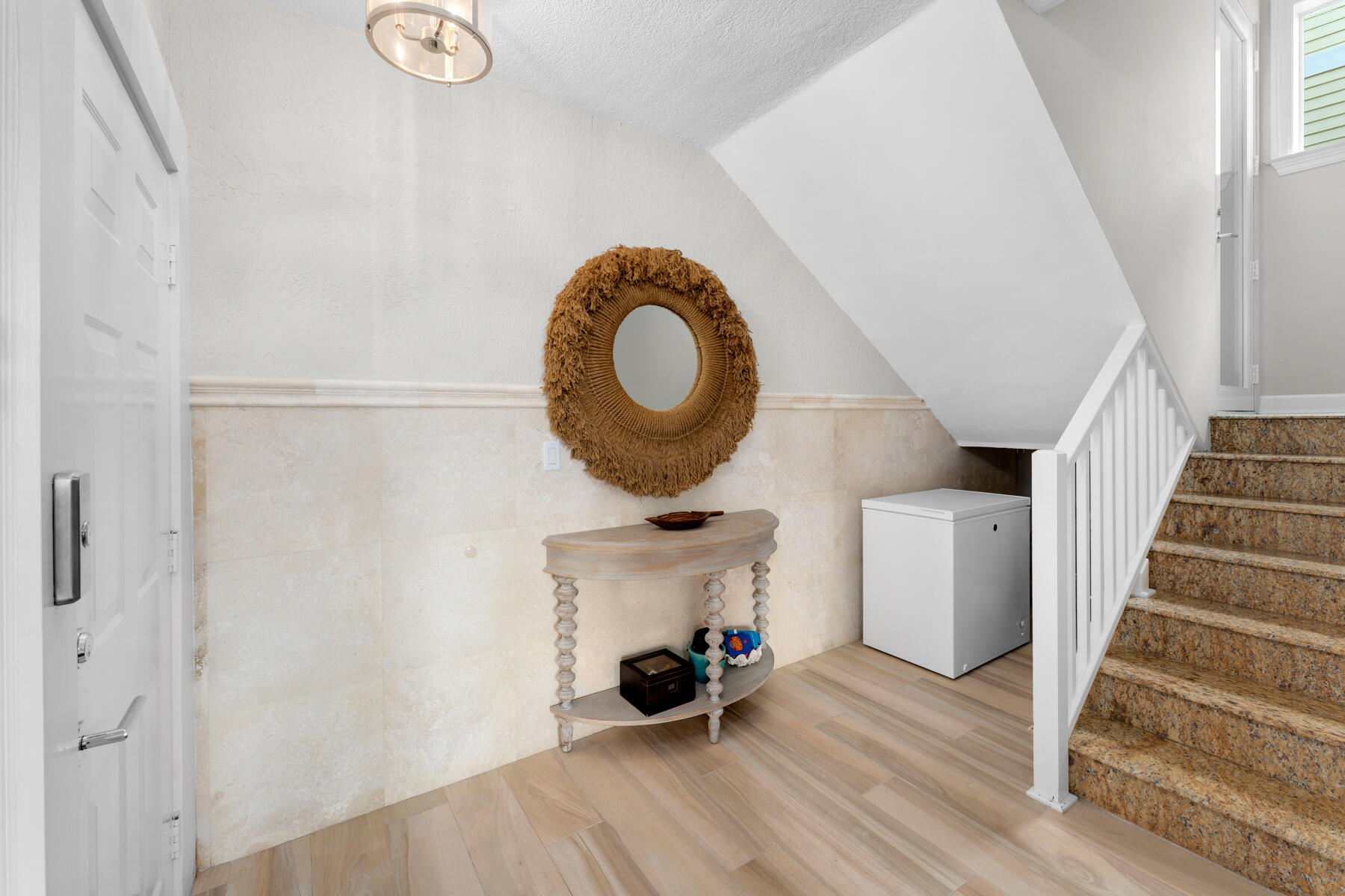 108 North Bounty Lane Key Largo, FL 33037 - Photo 11 of 79 a view of a room with wooden floor and lots of windows