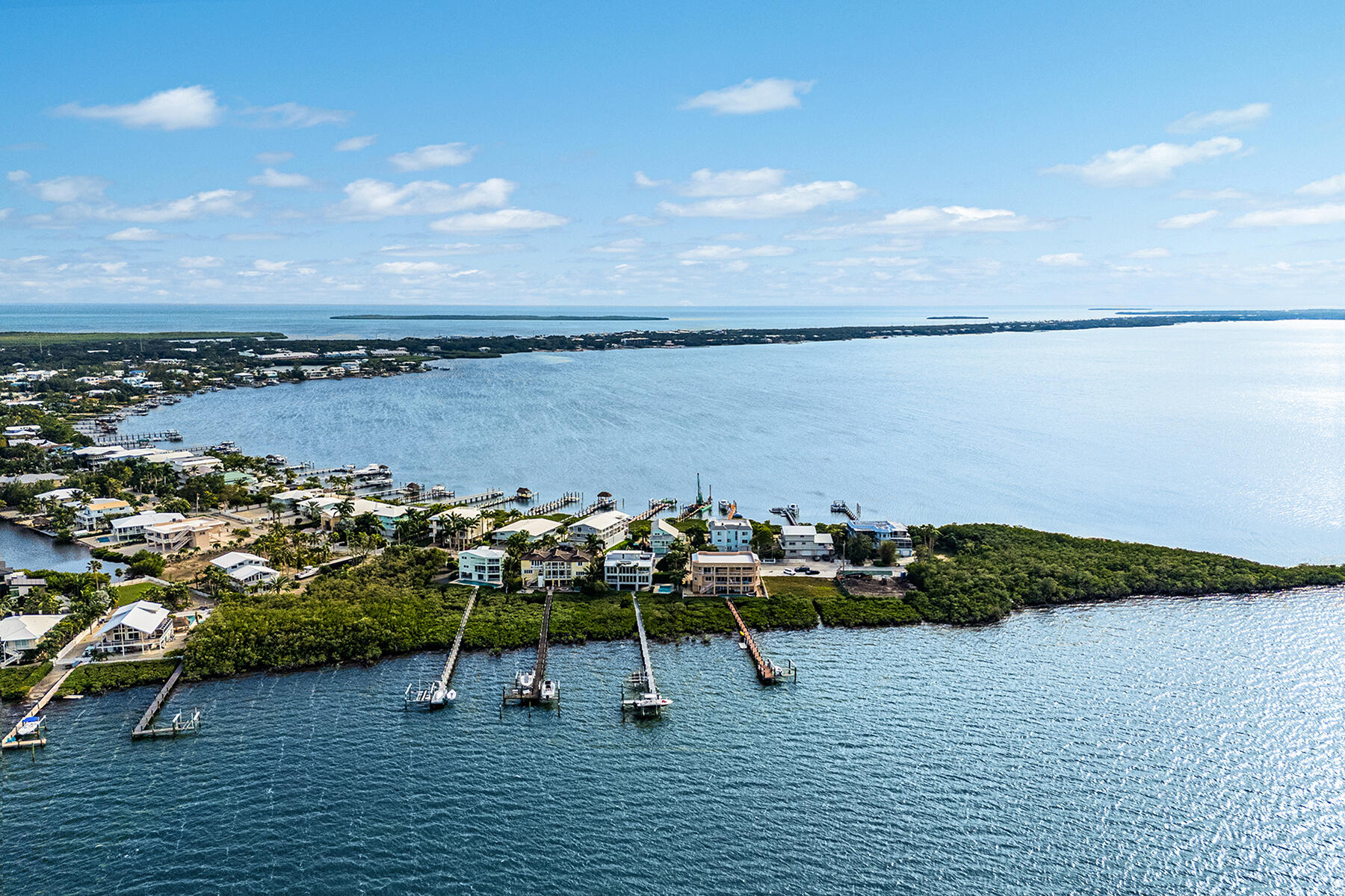108 North Bounty Lane Key Largo, FL 33037 - Photo 66 of 79 a view of a lake with houses