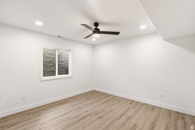 870 North Ada Loop Lehi, UT 84048 - Photo 43 of 51 Spacious room featuring wood-finish flooring, recessed lighting, and a modern ceiling fan