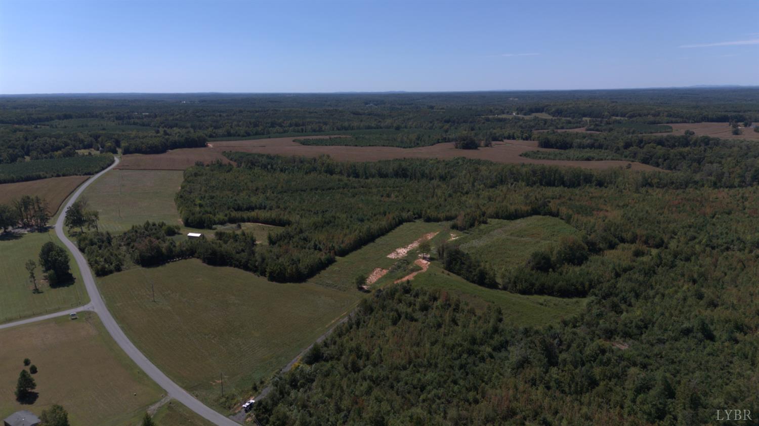 1 Coles Ferry Road Nathalie, VA 24577 - Photo 5 of 8 a view of a house with a yard