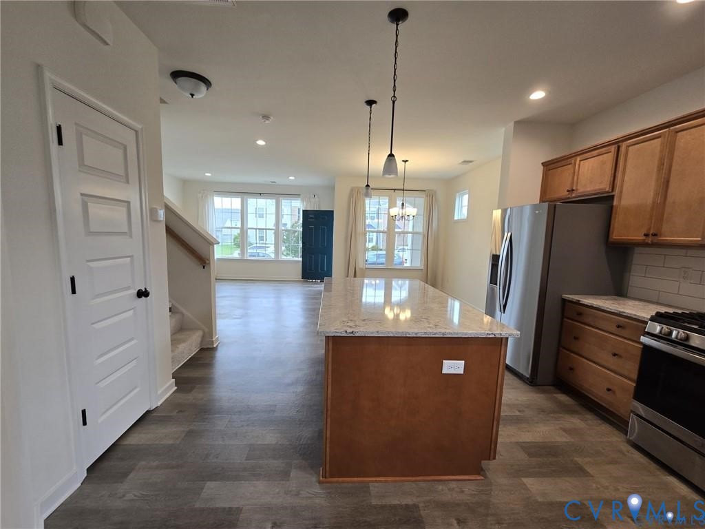 7825 Old Guild Road Richmond, VA 23237 - Photo 7 of 27 Kitchen featuring a central island with a light-to