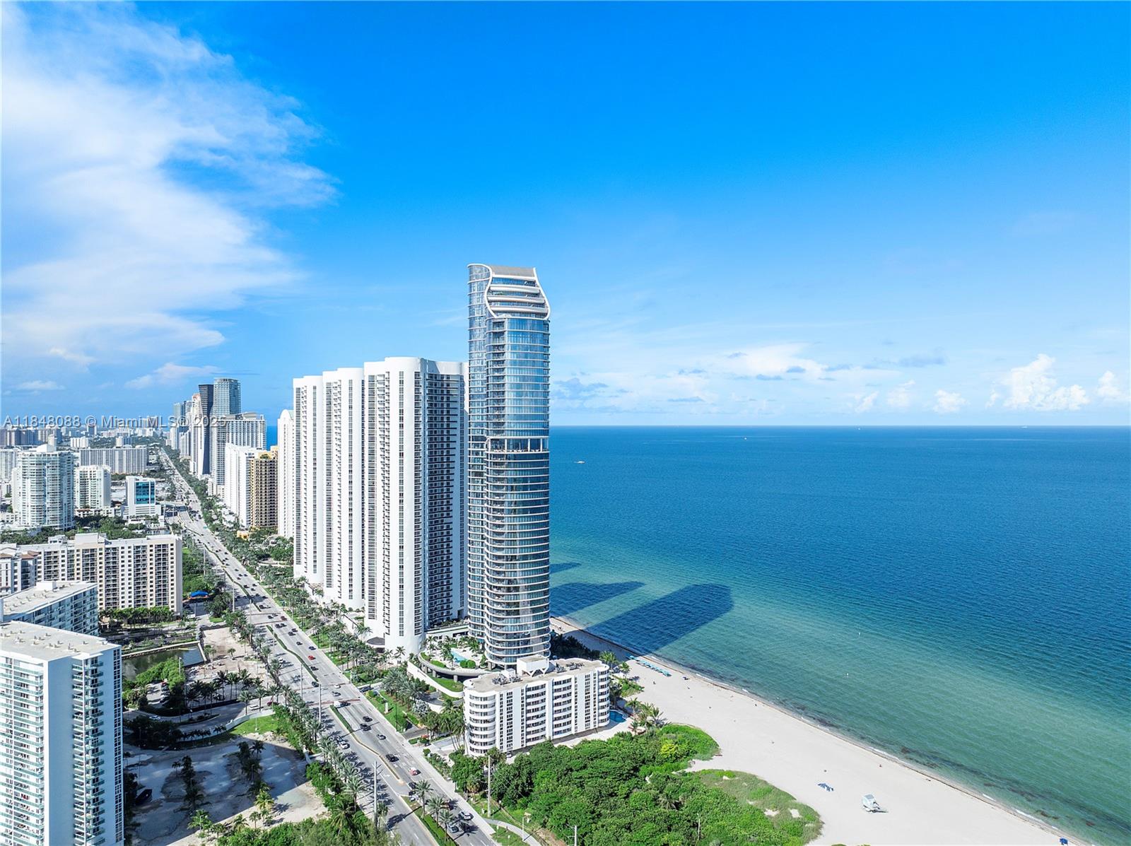 15701 Collins Avenue, Unit 3605 Sunny Isles Beach, FL 33160 - Photo 1 of 46 a view of a city with tall buildings