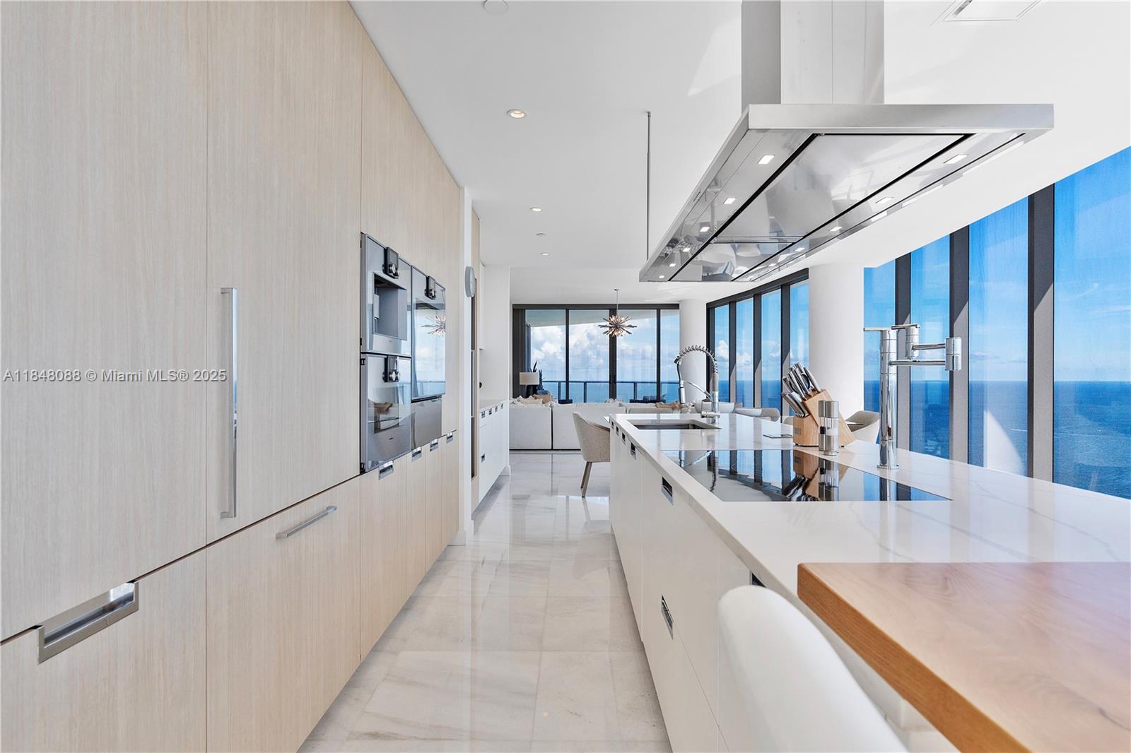 15701 Collins Avenue, Unit 3605 Sunny Isles Beach, FL 33160 - Photo 15 of 46 a view of a living room with furniture